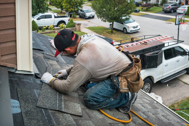 Professional Roofing technician working in Olmstead, KY